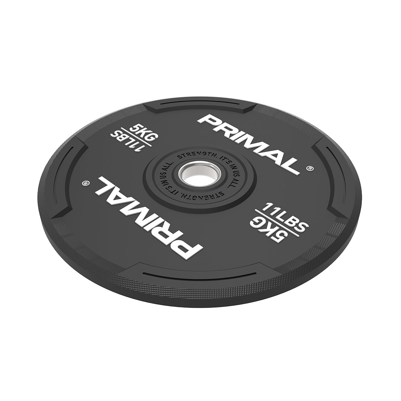 A 25kg single black rubber bumper plate with quad grip handles lying on a floor.